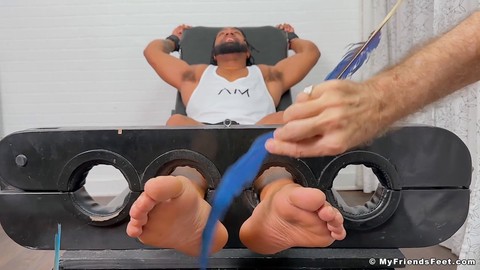 Body tickling session with a bearded muscular guy and foot fetish fun