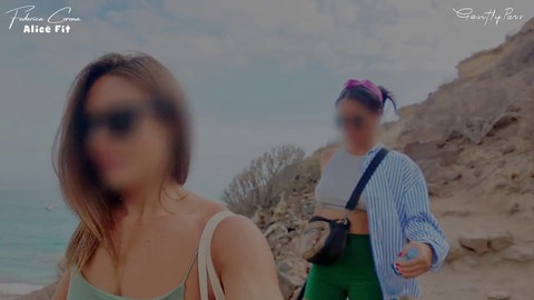 Two stunning fit girls having fun at the beach